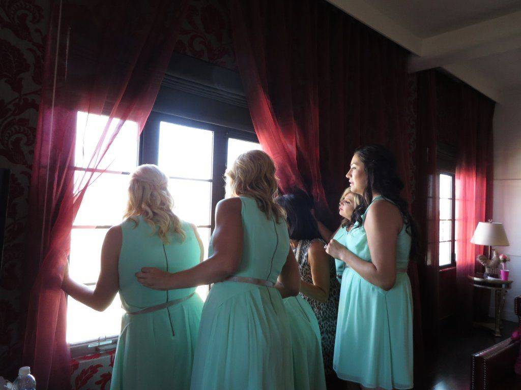 This is such a cute photo, the bridal party and Patty MOB are watching all of the guests arrive.